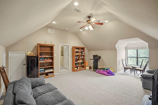 interior space featuring lofted ceiling, carpet flooring, recessed lighting, and visible vents