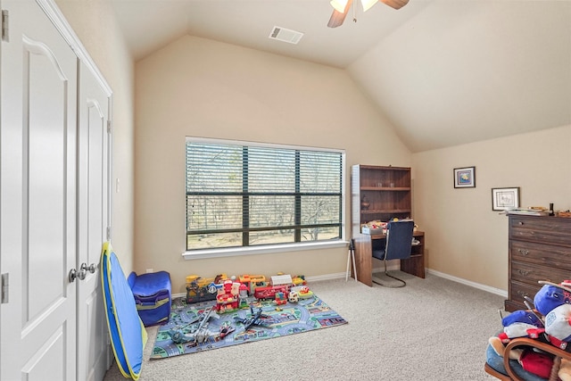 carpeted bedroom with visible vents, ceiling fan, baseboards, and vaulted ceiling