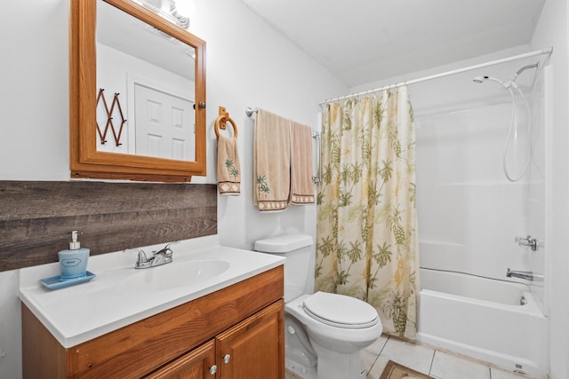 bathroom with vanity, tile patterned floors, toilet, and shower / bath combo