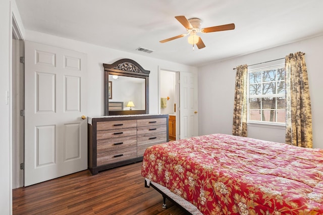 bedroom with visible vents, a ceiling fan, and dark wood-style flooring