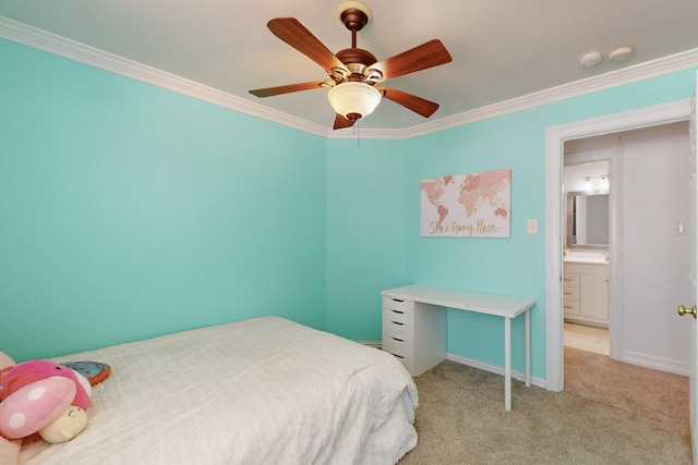 carpeted bedroom featuring baseboards, ornamental molding, and a ceiling fan