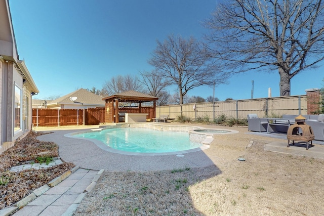 view of swimming pool featuring a fenced backyard, a gazebo, a fenced in pool, an in ground hot tub, and a patio area