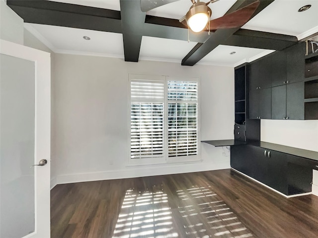 interior space with wood finished floors, baseboards, coffered ceiling, beam ceiling, and crown molding