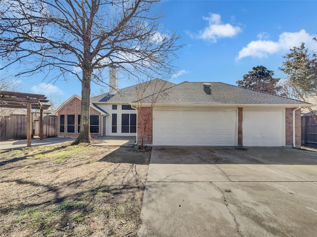 single story home with fence, driveway, a pergola, a garage, and brick siding