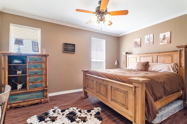 bedroom with dark wood-type flooring, baseboards, and ornamental molding