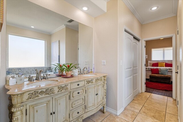 2885 Enloe Rd, Howe, TX 75459 - bathroom featuring double vanity, crown molding, tile patterned flooring, ensuite bath, and recessed lighting