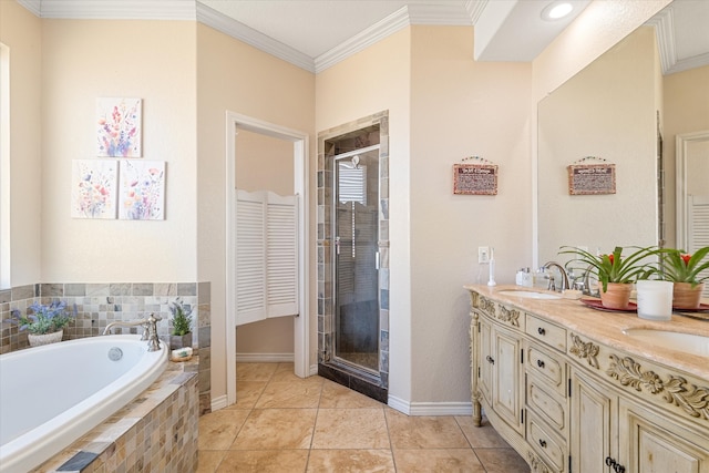 full bath with a sink, a garden tub, a shower stall, and crown molding