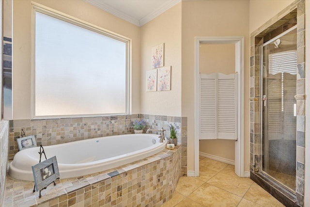 bathroom featuring a shower stall, a healthy amount of sunlight, and ornamental molding