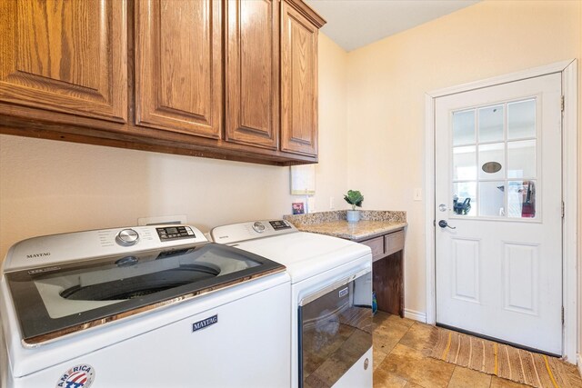 2885 Enloe Rd, Howe, TX 75459 - washroom with cabinet space and separate washer and dryer