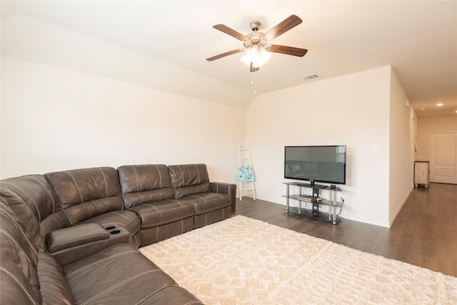 living room with lofted ceiling, baseboards, visible vents, and dark wood-style flooring