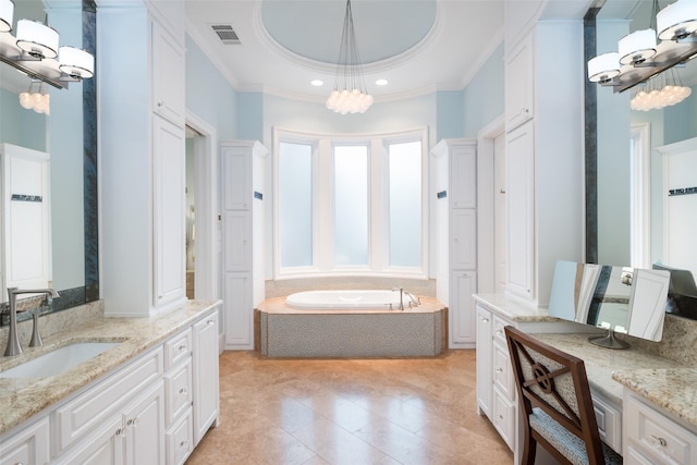 bathroom with visible vents, crown molding, a chandelier, a tray ceiling, and vanity