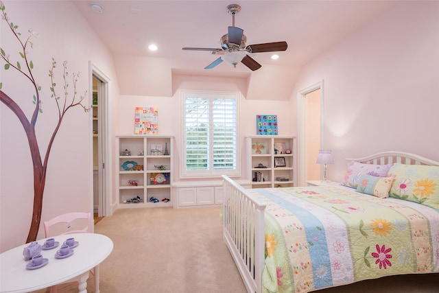 bedroom featuring recessed lighting, light colored carpet, and ceiling fan