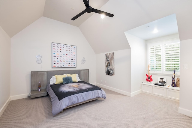 bedroom featuring light carpet, ceiling fan, baseboards, and vaulted ceiling