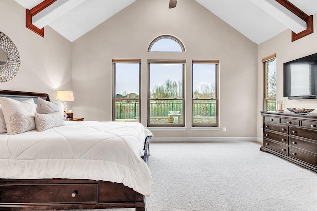 carpeted bedroom featuring beamed ceiling, a ceiling fan, baseboards, and high vaulted ceiling