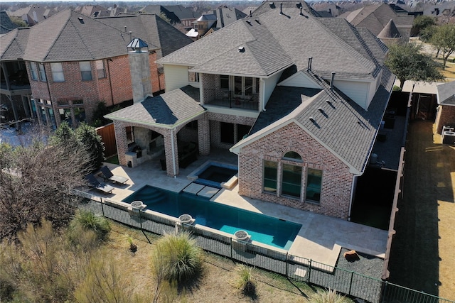 birds eye view of property with a residential view