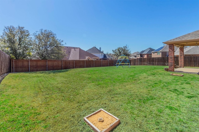 view of yard featuring a fenced backyard