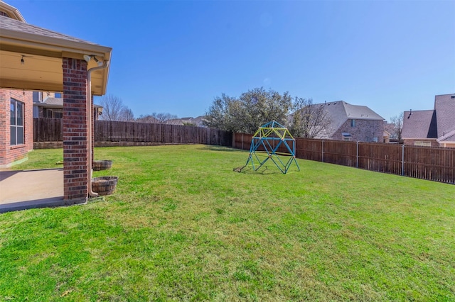 view of yard featuring a patio and a fenced backyard