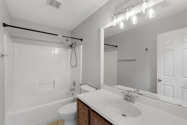 bathroom featuring vanity, toilet, tile patterned floors, bathing tub / shower combination, and visible vents
