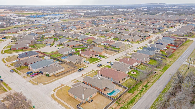 birds eye view of property with a residential view