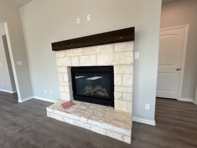 1412 Cedar Trl, Azle, TX 76020 - detailed view of wood finished floors, baseboards, and a fireplace