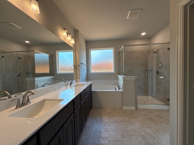 1412 Cedar Trl, Azle, TX 76020 - bathroom with a garden tub, a shower stall, double vanity, and recessed lighting