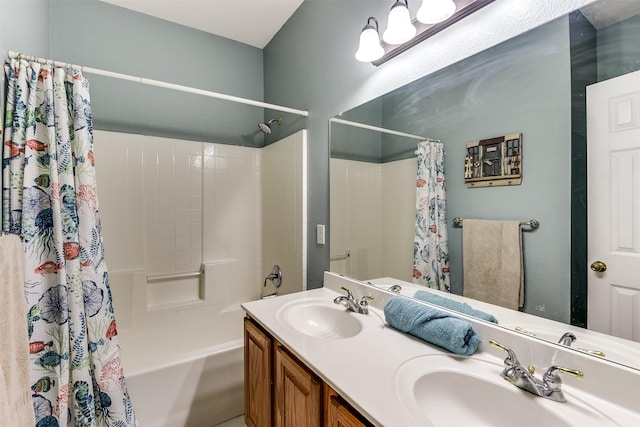 bathroom with a sink, shower / bath combo, and double vanity