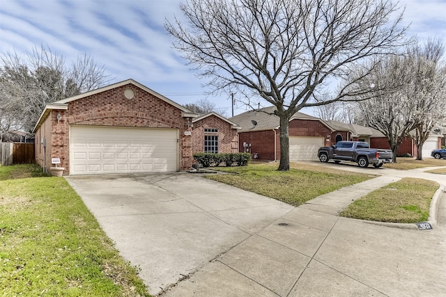 single story home with a front lawn, fence, concrete driveway, a garage, and brick siding