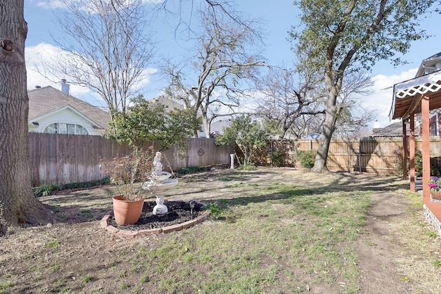 view of yard featuring a fenced backyard