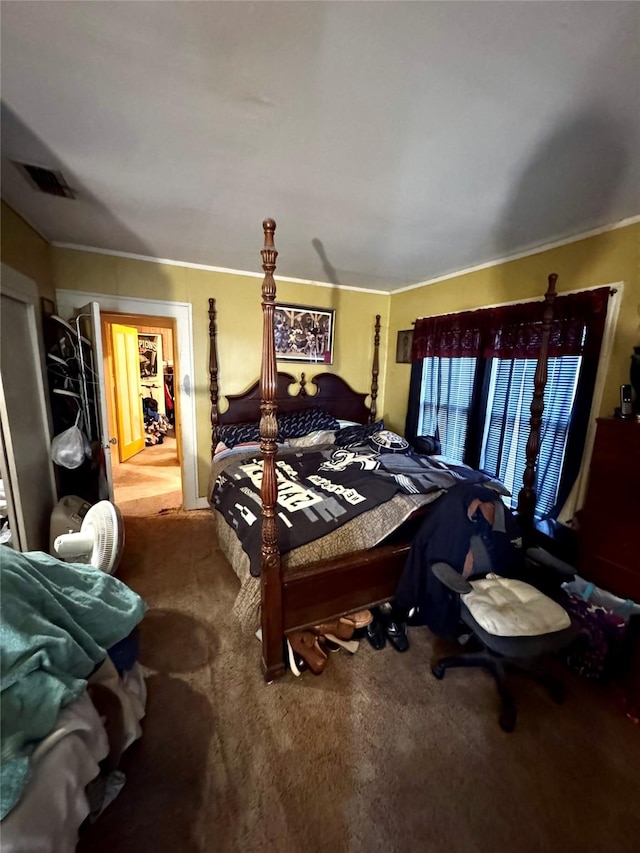 bedroom with carpet and visible vents