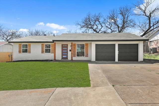 view of front facade with driveway, an attached garage, central AC, a front lawn, and brick siding