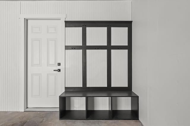 mudroom with concrete flooring