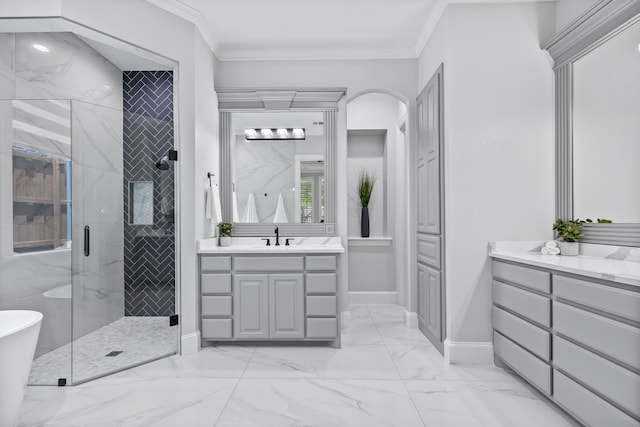 full bathroom featuring marble finish floor, a stall shower, vanity, and ornamental molding