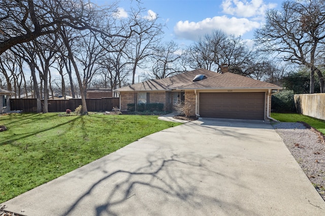 view of front of property with a front yard, a chimney, an attached garage, and fence