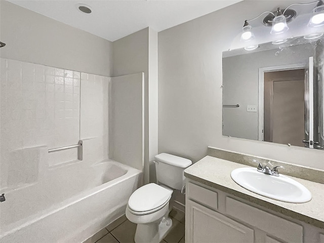 full bath featuring shower / bath combination, toilet, vanity, and tile patterned flooring