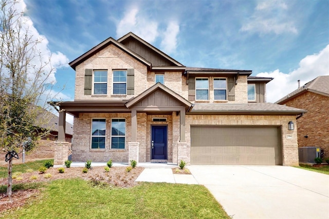 craftsman-style home with driveway, brick siding, a garage, central air condition unit, and board and batten siding