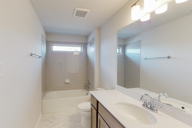 bathroom featuring visible vents, toilet, bathing tub / shower combination, marble finish floor, and vanity