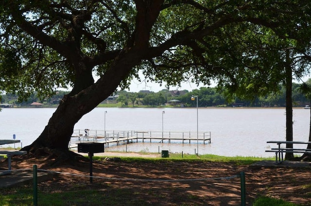 view of dock with a water view