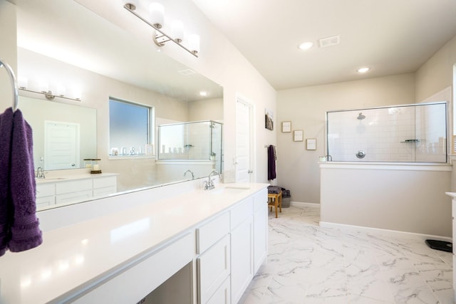 full bathroom featuring a shower with door, baseboards, recessed lighting, marble finish floor, and vanity