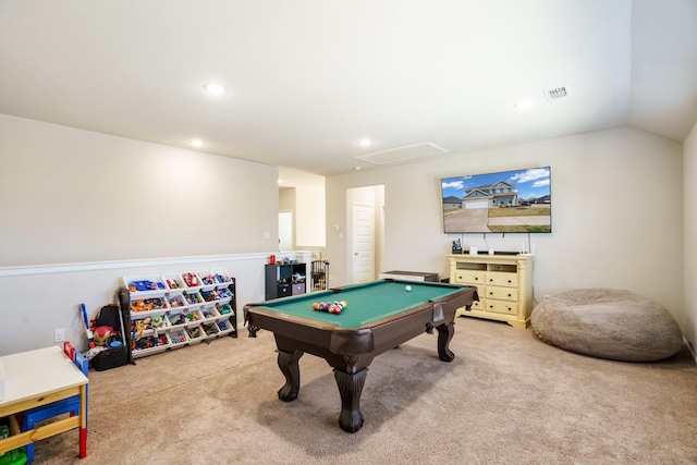 recreation room with carpet, visible vents, attic access, lofted ceiling, and recessed lighting