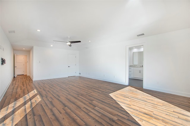 unfurnished living room with visible vents, wood finished floors, recessed lighting, baseboards, and ceiling fan