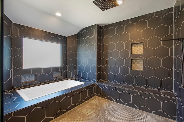 full bathroom with a garden tub, recessed lighting, and tiled shower