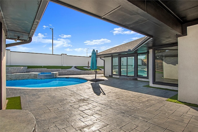 view of pool featuring a patio, fence, and a fenced in pool