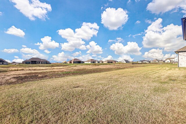 view of yard featuring a residential view