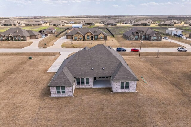 drone / aerial view featuring a residential view