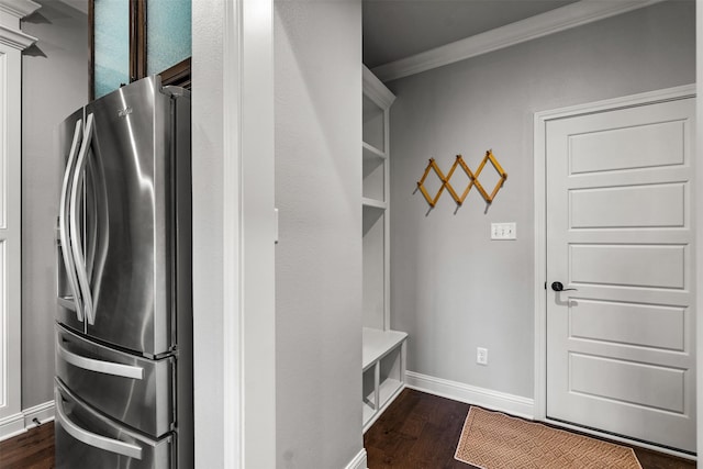 mudroom with crown molding, dark wood-type flooring, and baseboards