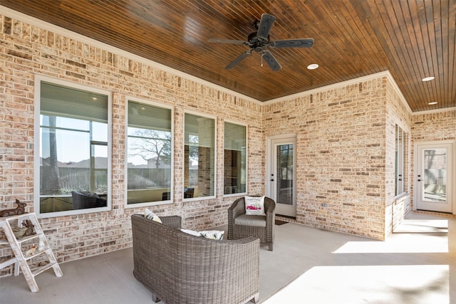 view of patio featuring ceiling fan