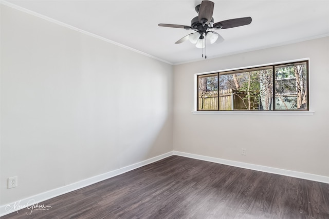 unfurnished room with baseboards, dark wood finished floors, a ceiling fan, and ornamental molding