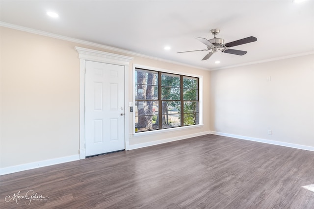 empty room featuring recessed lighting, baseboards, dark wood-style floors, and crown molding