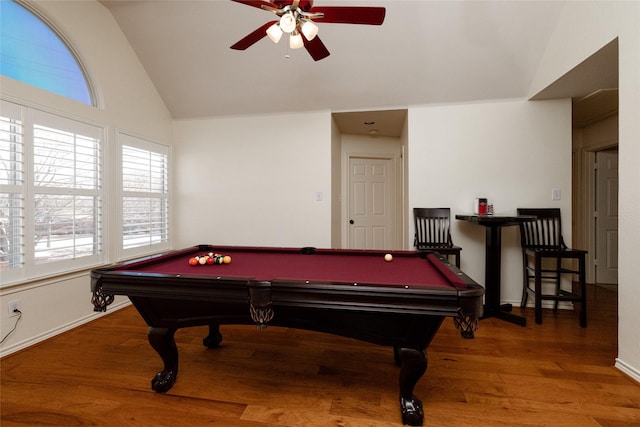 recreation room with ceiling fan, baseboards, lofted ceiling, wood finished floors, and billiards