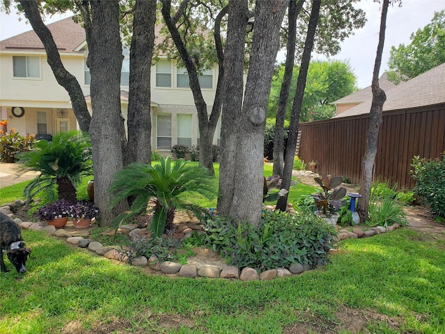 view of yard with fence